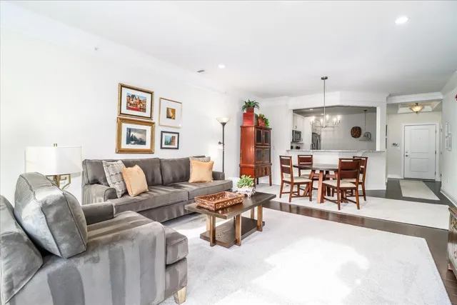 a living room with furniture and a table