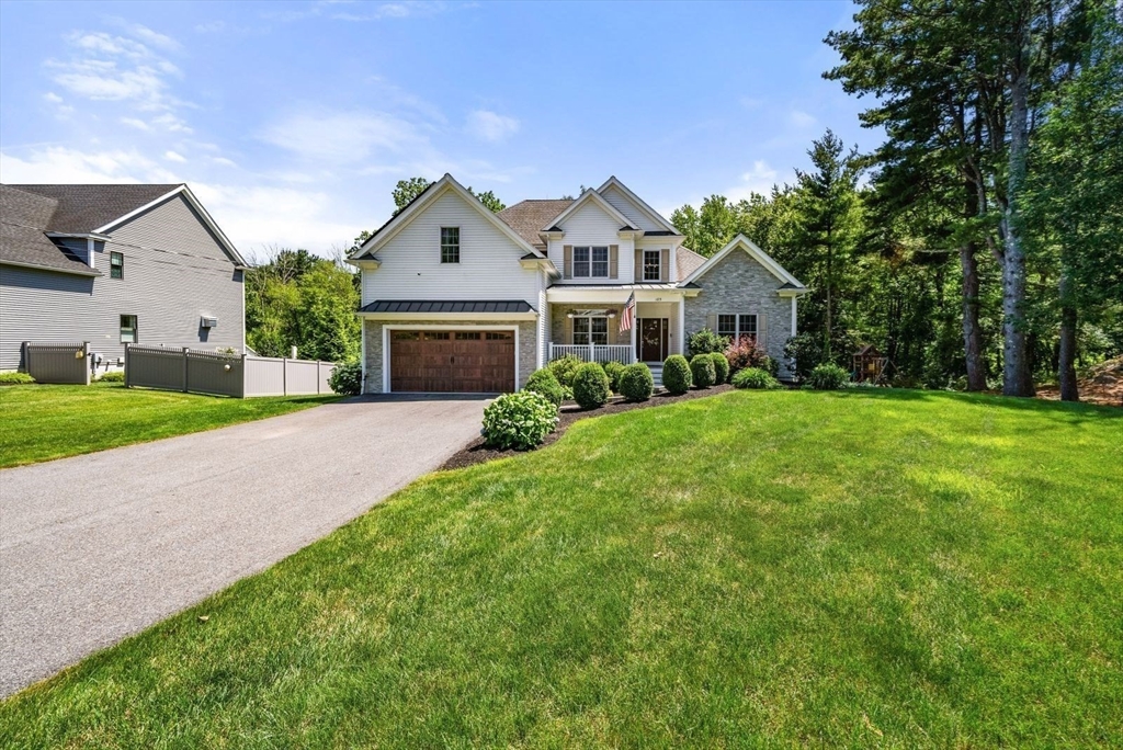 185 Bailey Street Canton, MA 02021 - Photo 2 of 42 a front view of house with yard and green space
