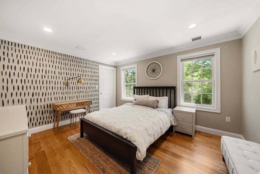185 Bailey Street Canton, MA 02021 - Photo 26 of 42 a bedroom with a large bed and a window