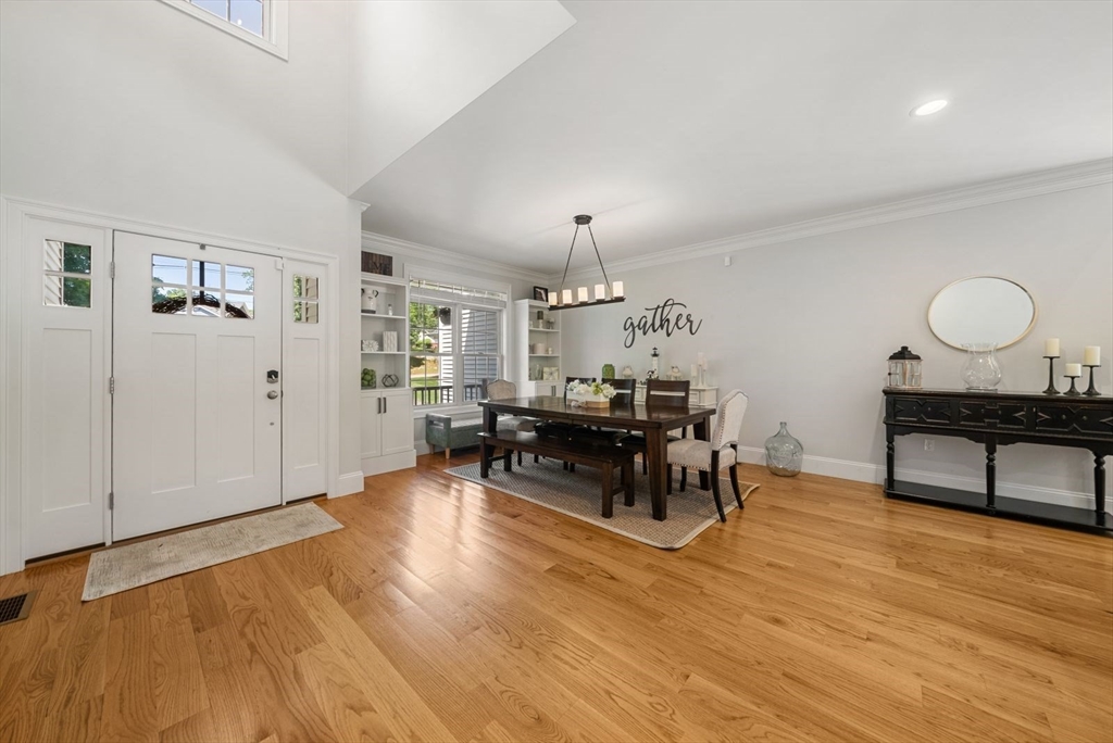 185 Bailey Street Canton, MA 02021 - Photo 3 of 42 a living room with furniture and a wooden floor