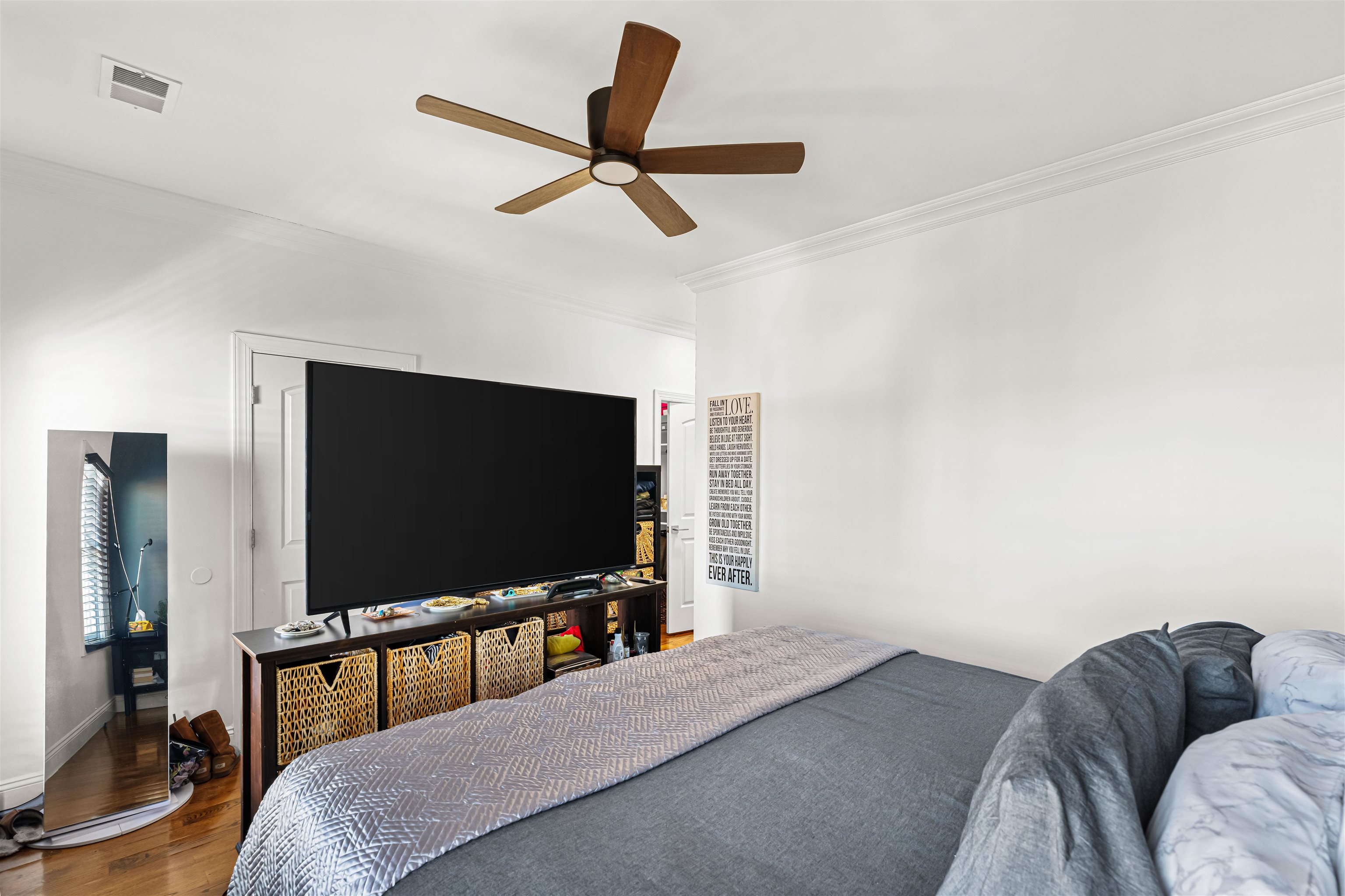 193 Halladay Street Jersey City, NJ 07304 - Photo 19 of 49 a bedroom with a bed and a flat screen tv