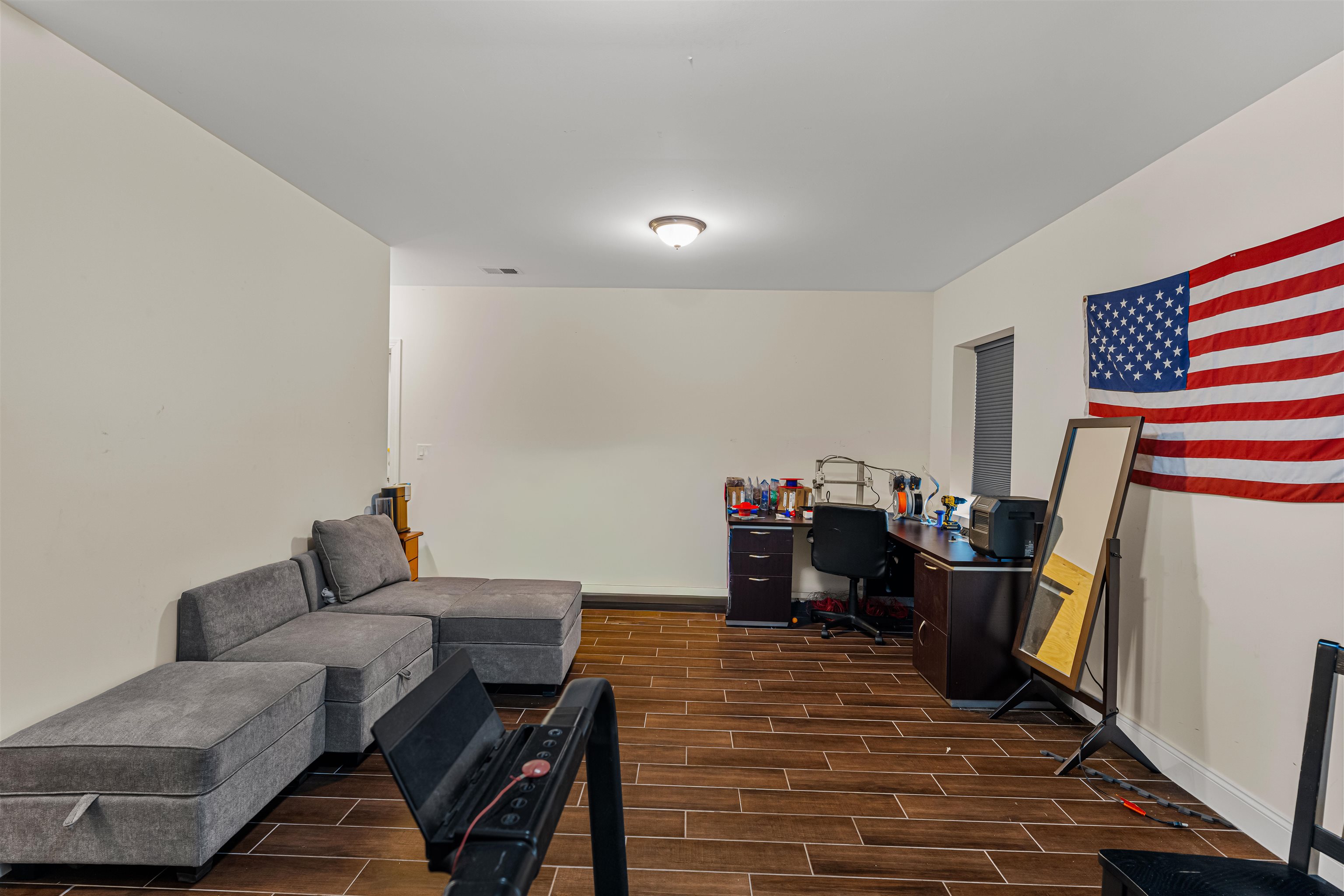 193 Halladay Street Jersey City, NJ 07304 - Photo 42 of 49 a living room with furniture and a flat screen tv