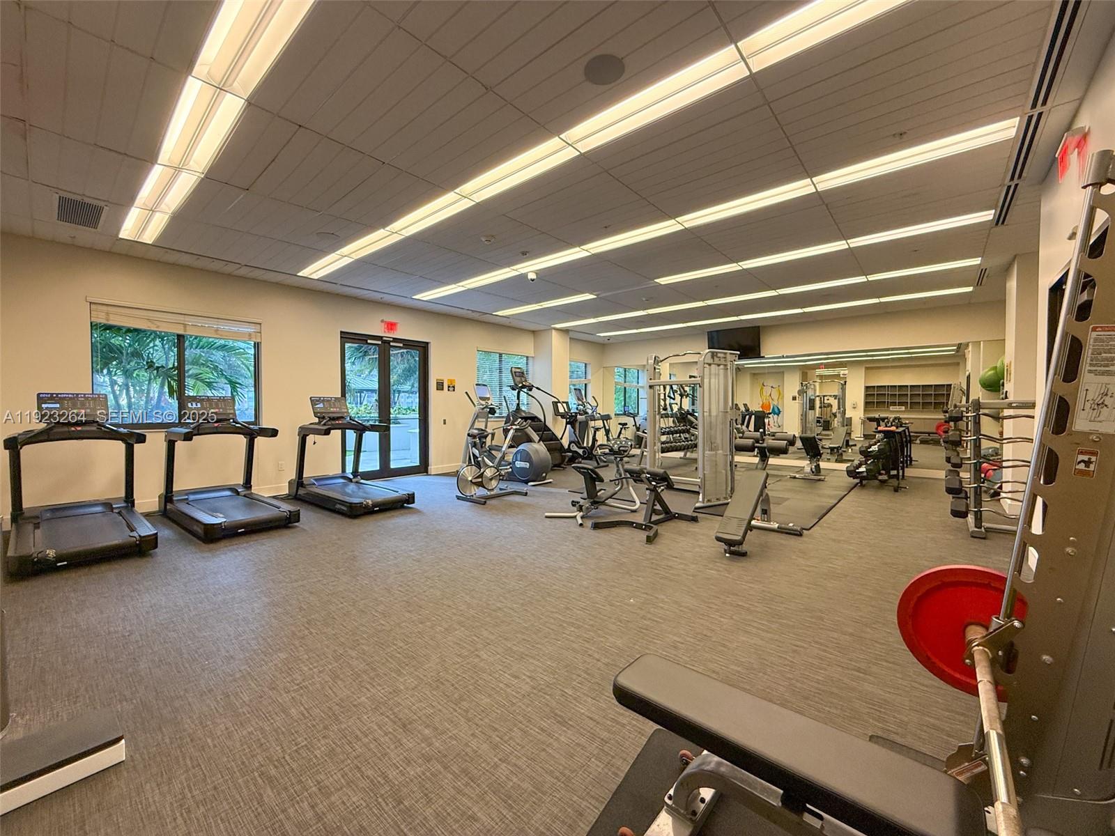 999 Southwest 1st Avenue, Unit 2801 Miami, FL 33130 - Photo 21 of 42 a view of a room with gym equipment