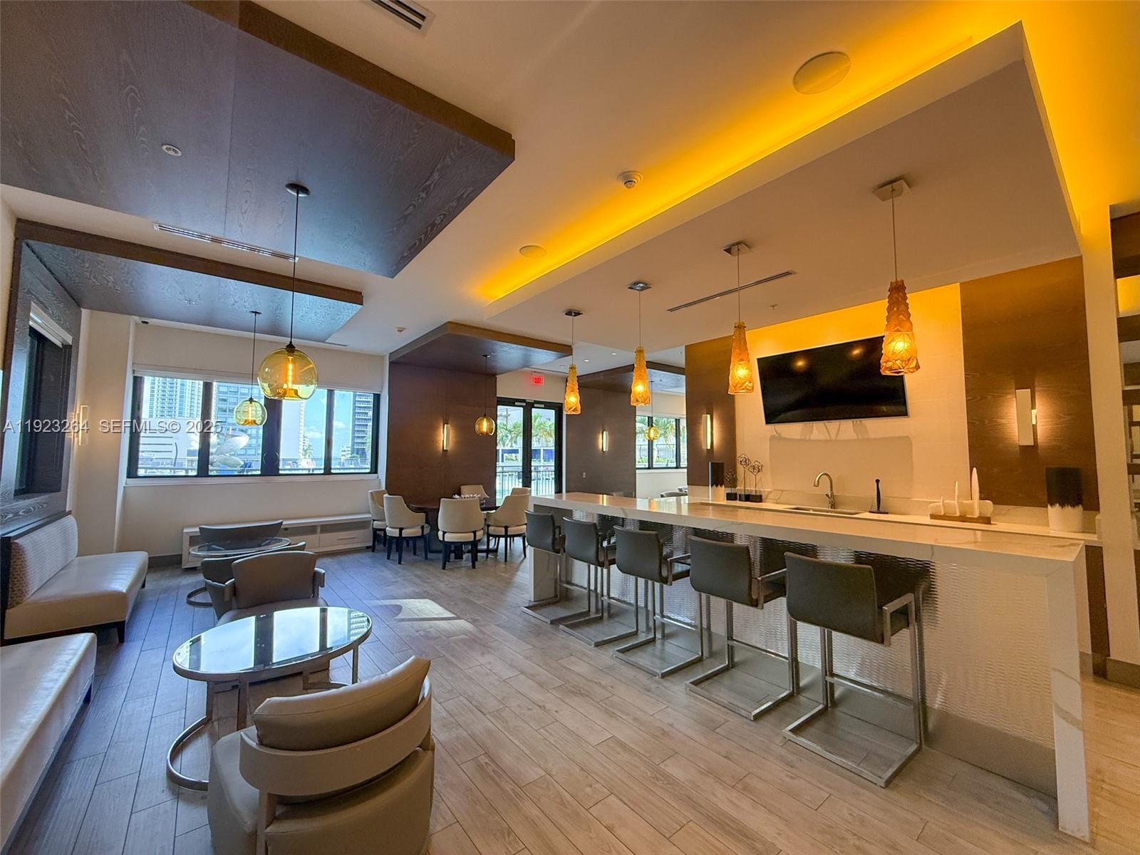 999 Southwest 1st Avenue, Unit 2801 Miami, FL 33130 - Photo 25 of 42 a view of a livingroom with furniture and window