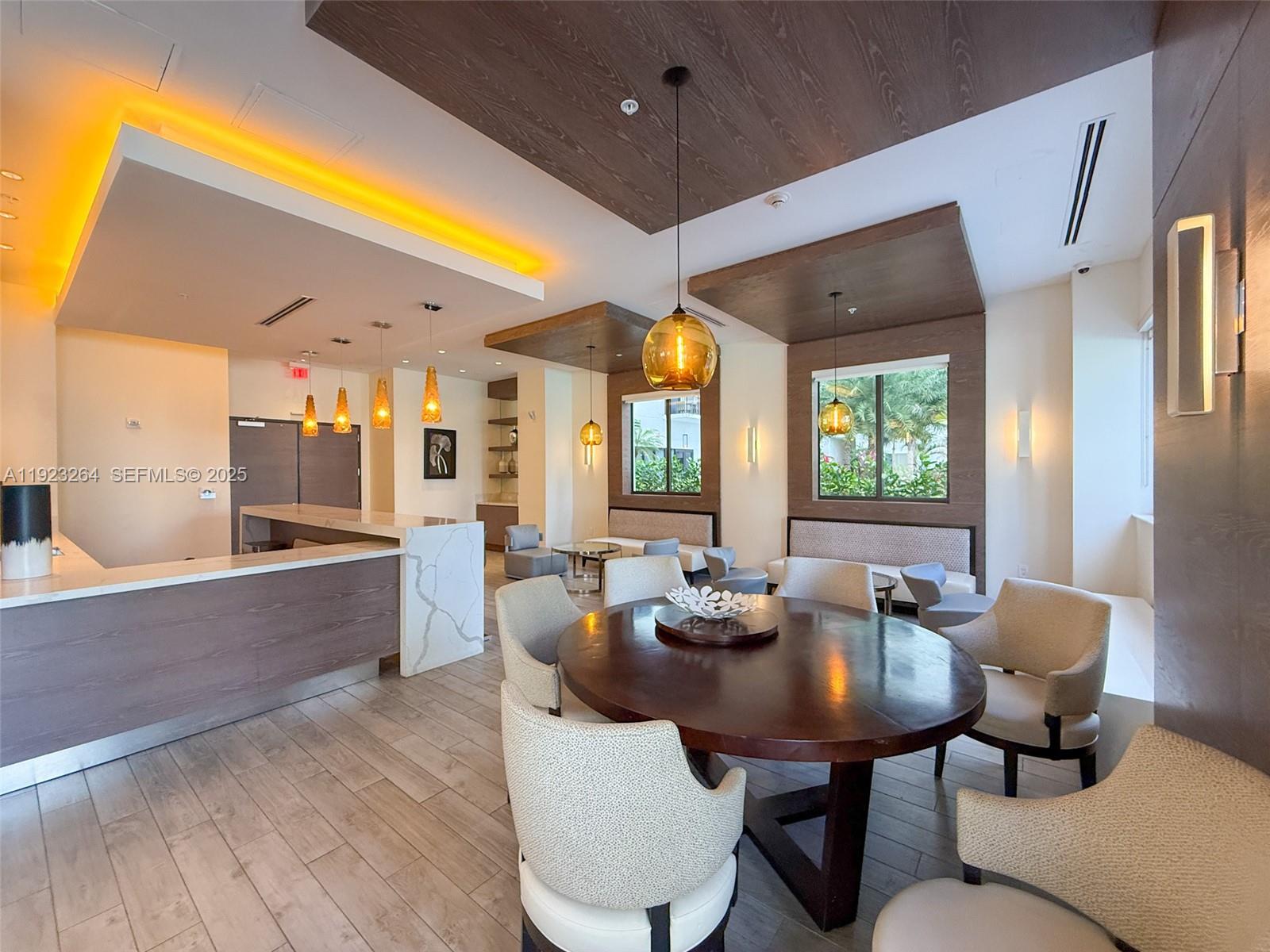 999 Southwest 1st Avenue, Unit 2801 Miami, FL 33130 - Photo 29 of 42 a view of a dining room with furniture and window