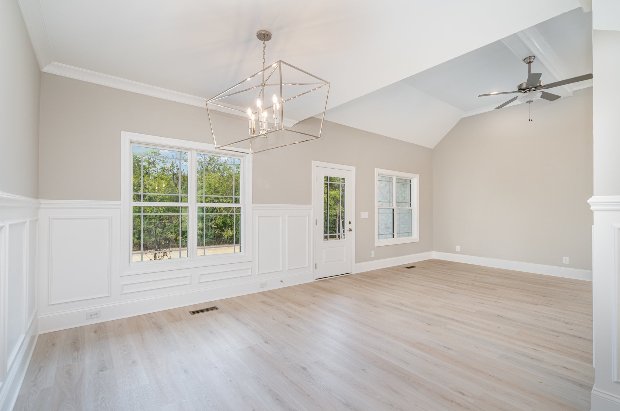 1815 Sulphur College Road Hartsville, TN 37074 - Photo 11 of 36 a view of an empty room with wooden floor and a window