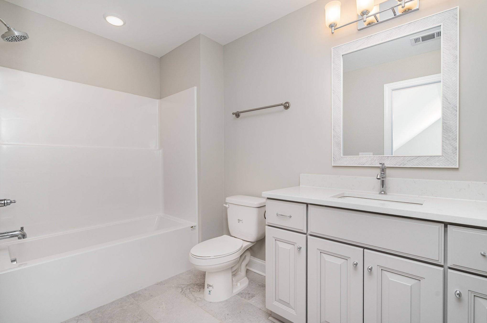1815 Sulphur College Road Hartsville, TN 37074 - Photo 30 of 36 a bathroom with a toilet a sink a mirror and a bathtub