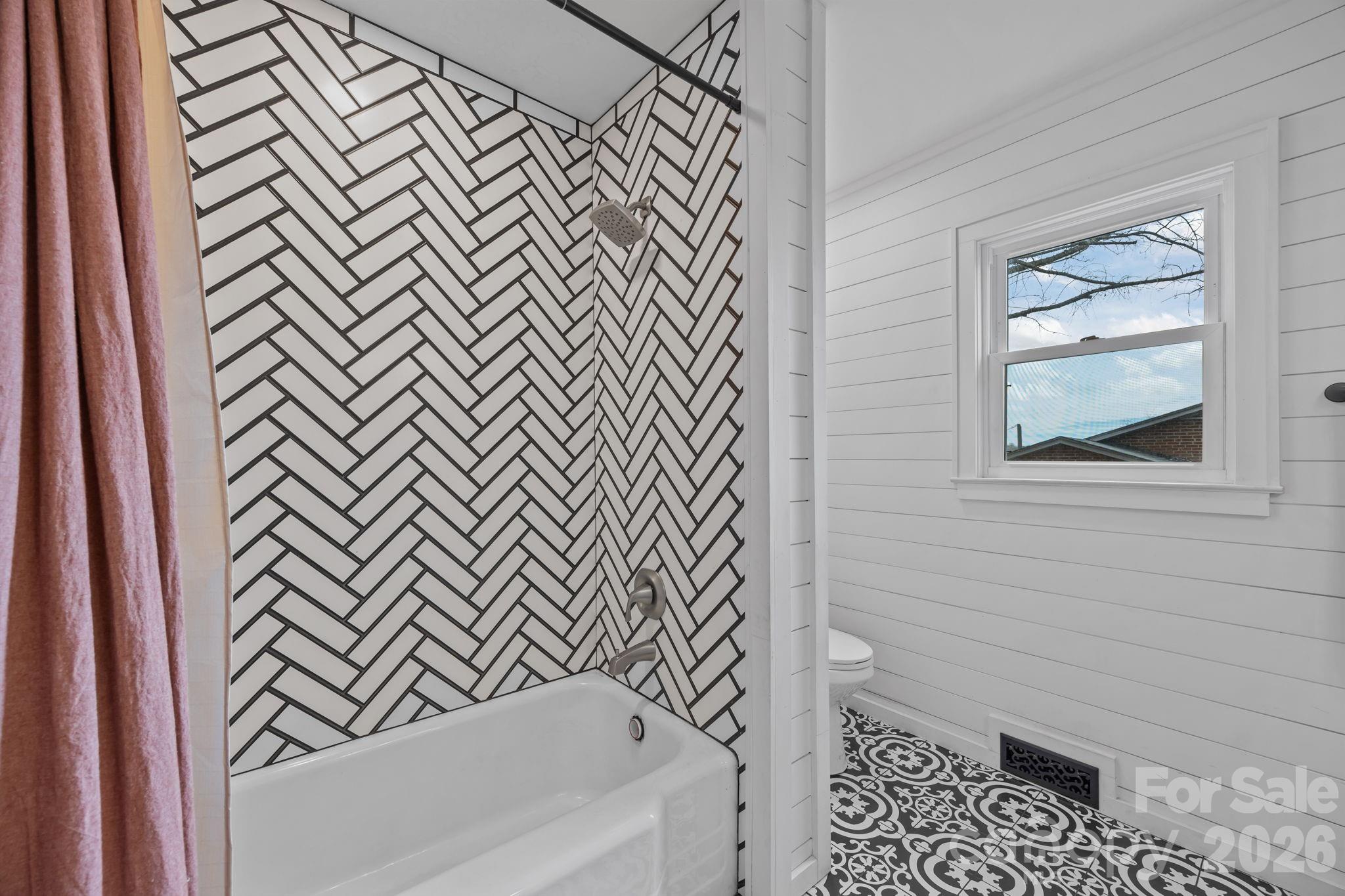 275 Tanner Street Rutherfordton, NC 28139 - Photo 38 of 44 a bathroom with a bathtub and a shower