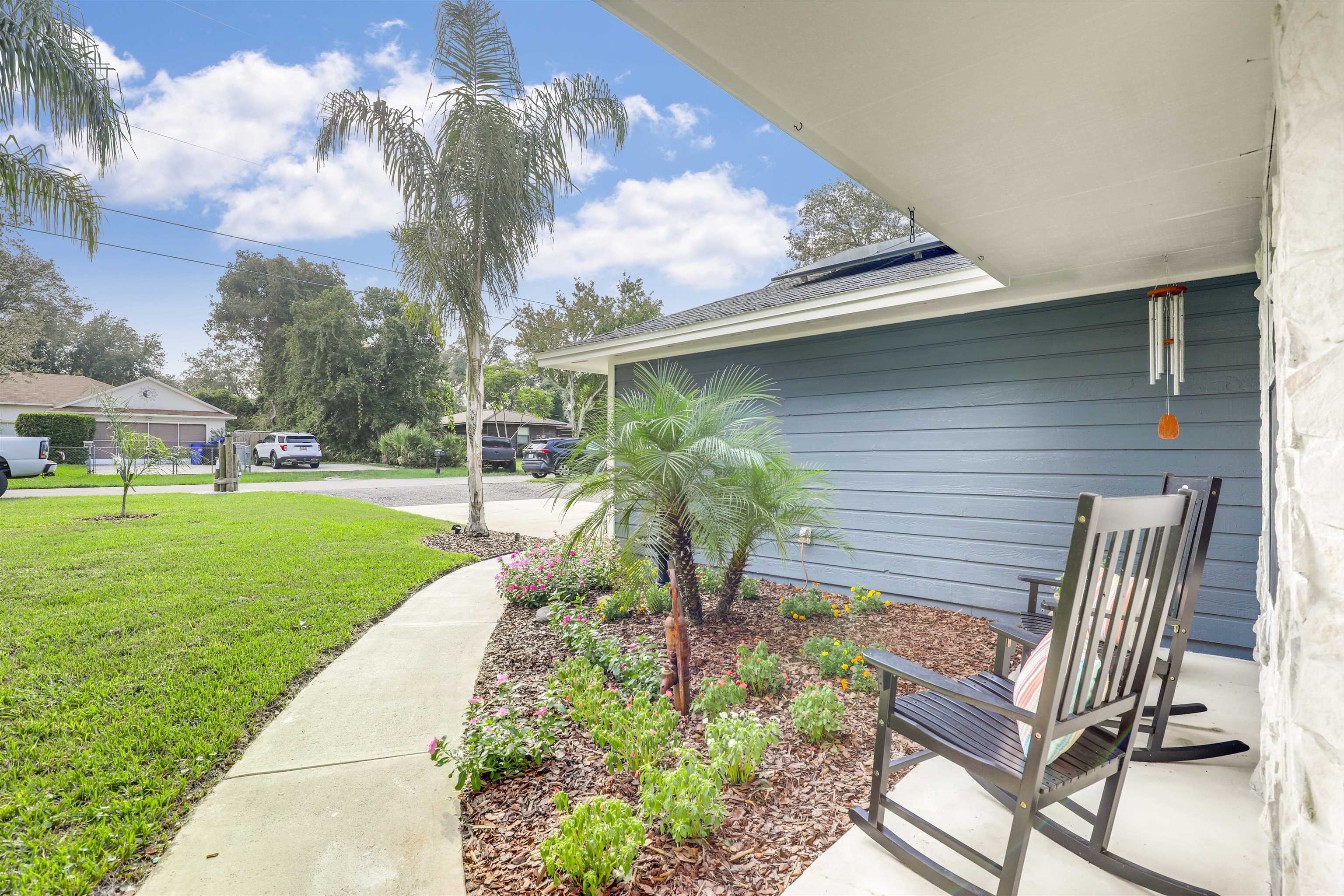 149 Jasmine Road St. Augustine, FL 32086 - Photo 5 of 61 a front view of a house with garden
