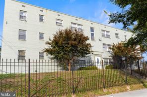 4820 C Street Southeast, Unit 103 Washington, DC 20019 - Photo 2 of 2 a view of a building from a balcony