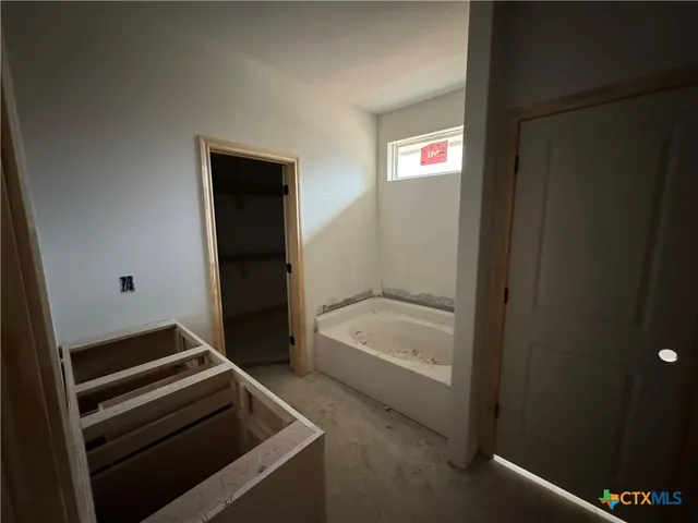 a bathroom with a bathtub