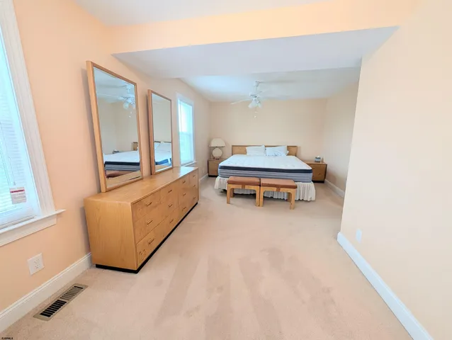 a room with furniture and a window