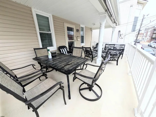 a view of a workspace with furniture
