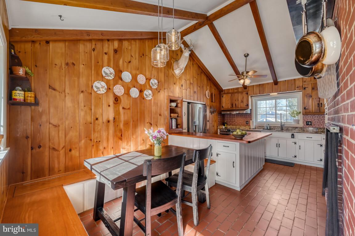 626 Ridgewood Road Bel Air, MD 21014 - Photo 12 of 33 a kitchen with a table and chairs