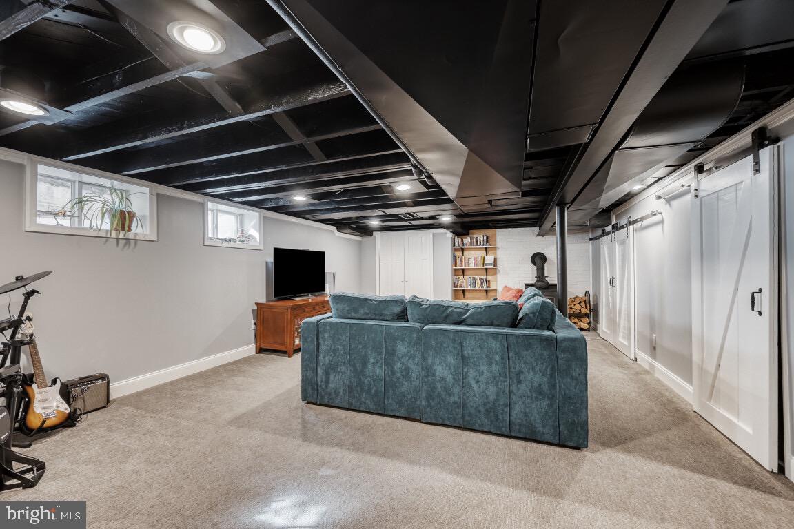 626 Ridgewood Road Bel Air, MD 21014 - Photo 17 of 33 a living room with furniture and a flat screen tv