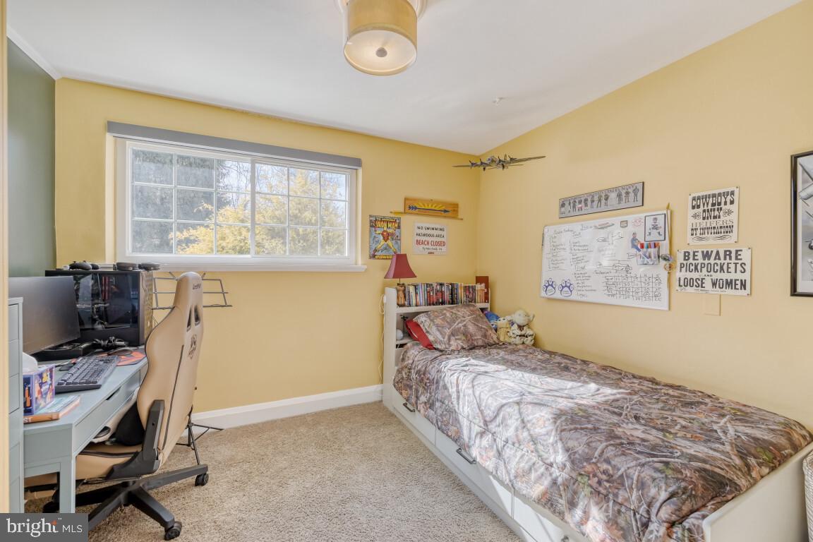 626 Ridgewood Road Bel Air, MD 21014 - Photo 23 of 33 a bedroom with a bed and a window
