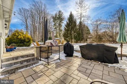 a view of a table and chairs on the deck