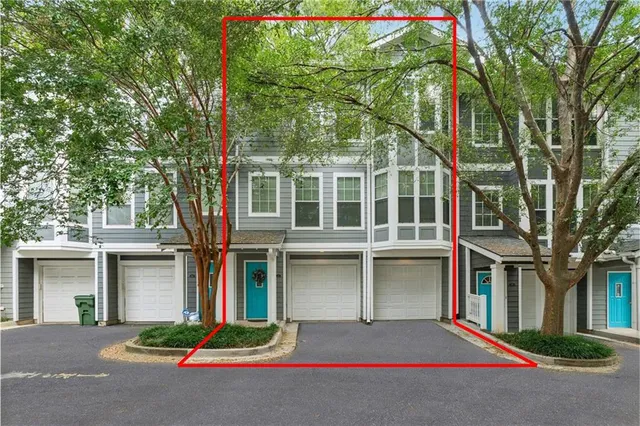 a house with trees in front of it