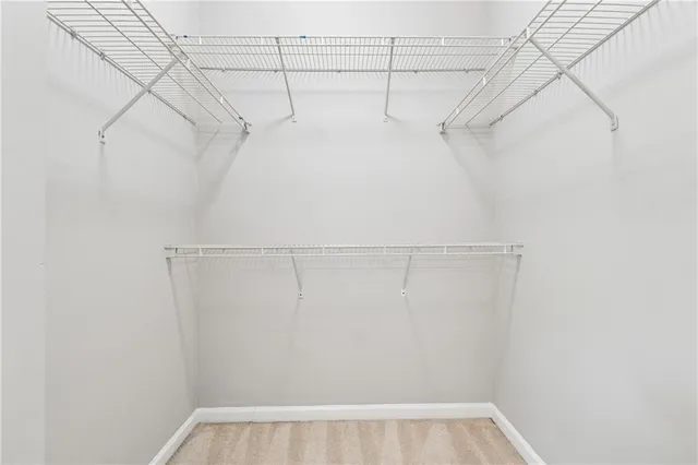 a view of a room with racks on the wall