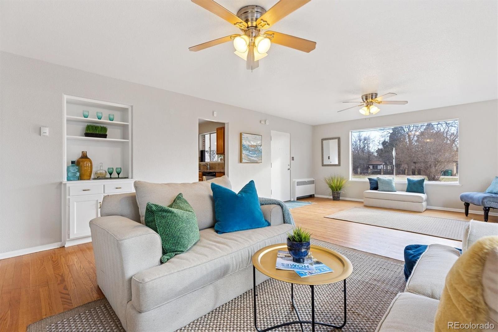 4675 Balsam Street Wheat Ridge, CO 80033 - Photo 15 of 30 a living room with furniture and a large window
