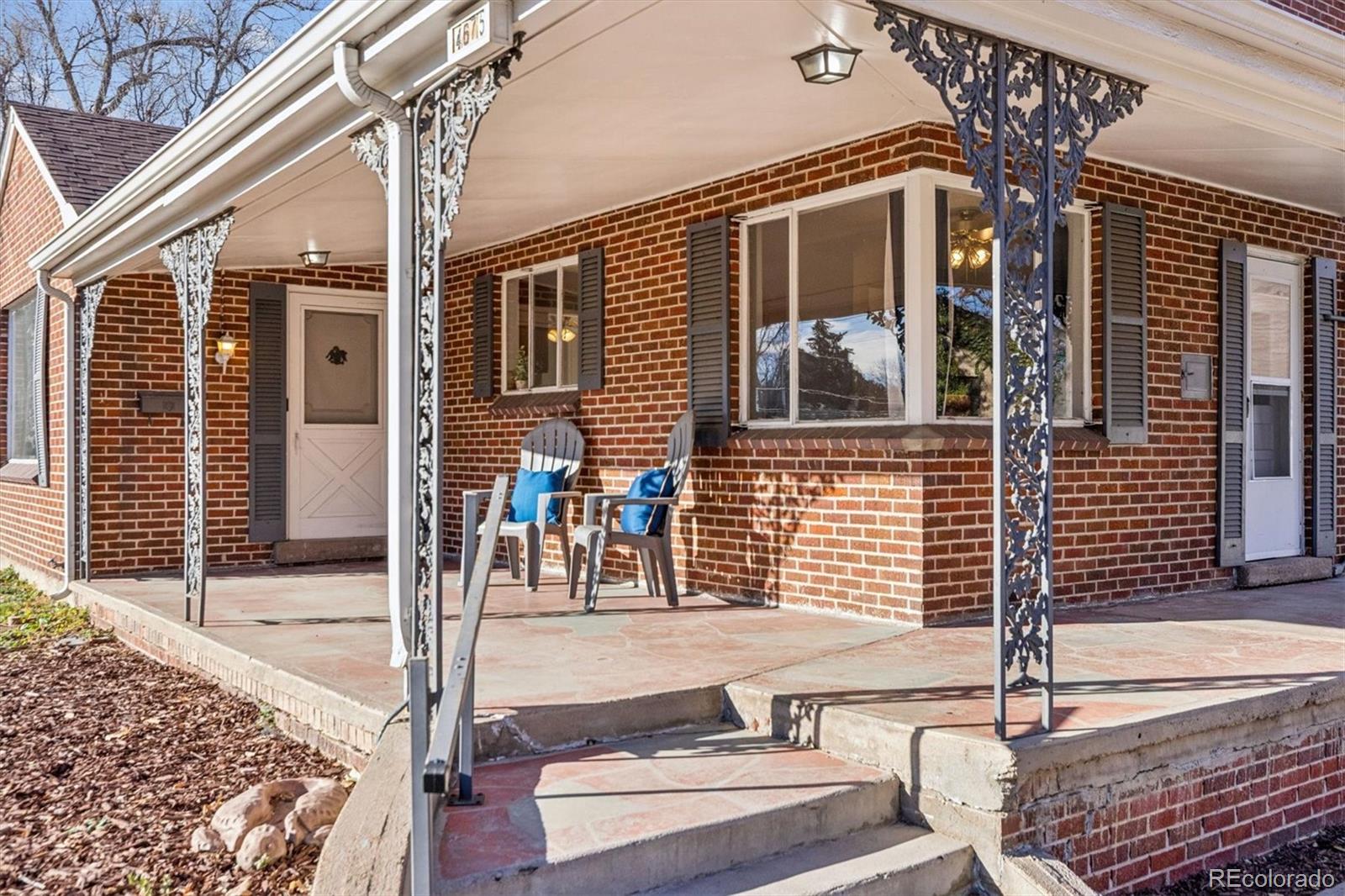 4675 Balsam Street Wheat Ridge, CO 80033 - Photo 3 of 30 a front view of a house