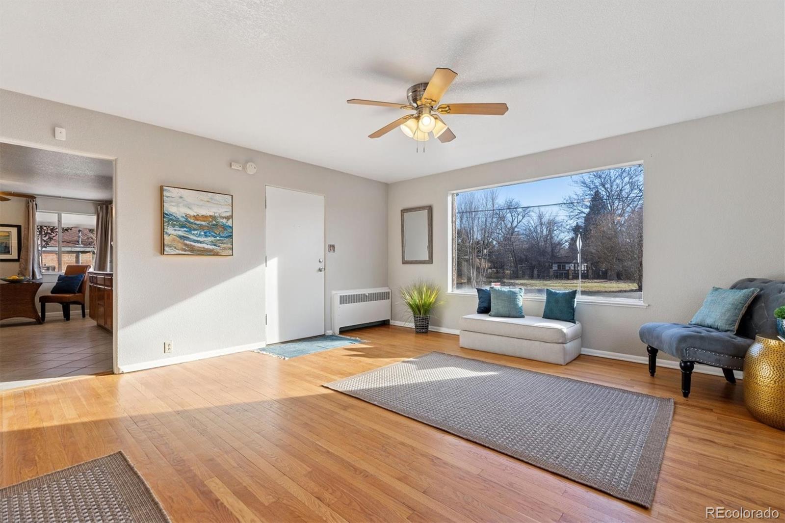 4675 Balsam Street Wheat Ridge, CO 80033 - Photo 6 of 30 a living room with furniture and a large window