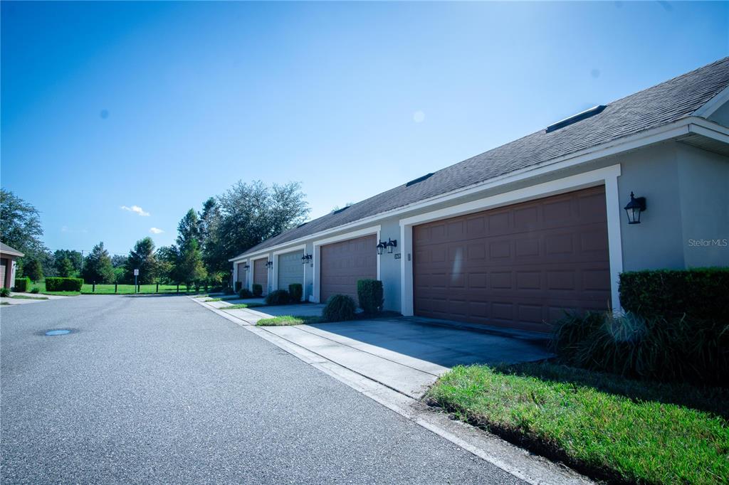 11636 Water Run Alley Windermere, FL 34786 - Photo 17 of 18 a house view with a backyard space