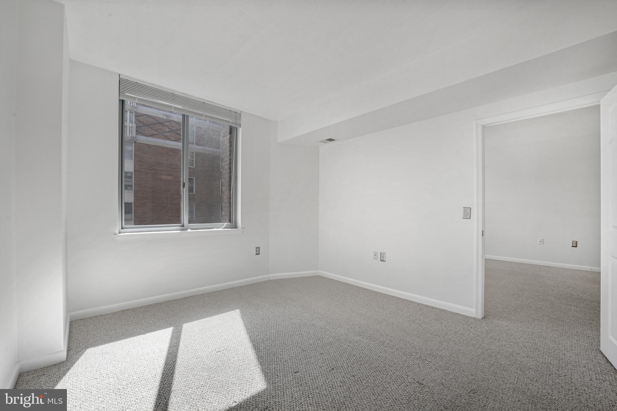 851 North Glebe Road, Unit 1608 Arlington, VA 22203 - Photo 13 of 24 a view of an empty room with a window