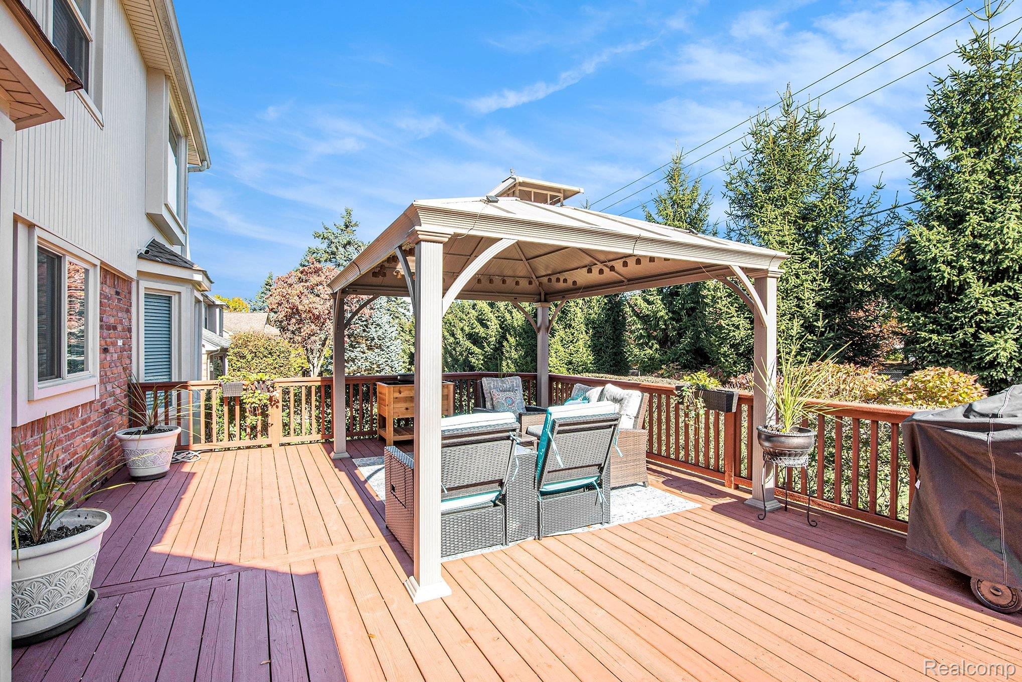 1941 Mapleridge Road Rochester, MI 48309 - Photo 50 of 55 Wooden terrace with a gazebo and an outdoor living space
