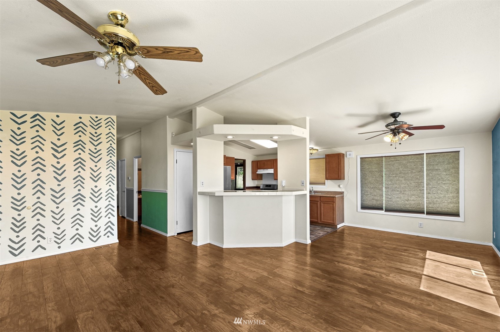 3053 Lummi Shore Road Bellingham, WA 98226 - Photo 19 of 37 a view of an empty room with a window and wooden floor