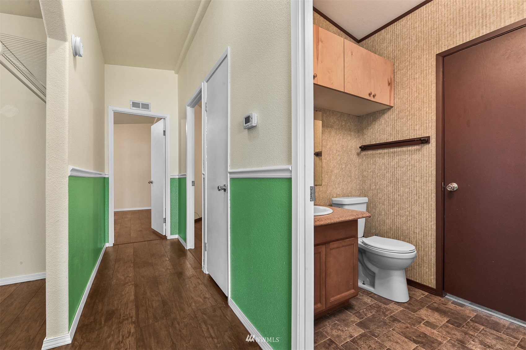 3053 Lummi Shore Road Bellingham, WA 98226 - Photo 20 of 37 a bathroom with a toilet and a sink