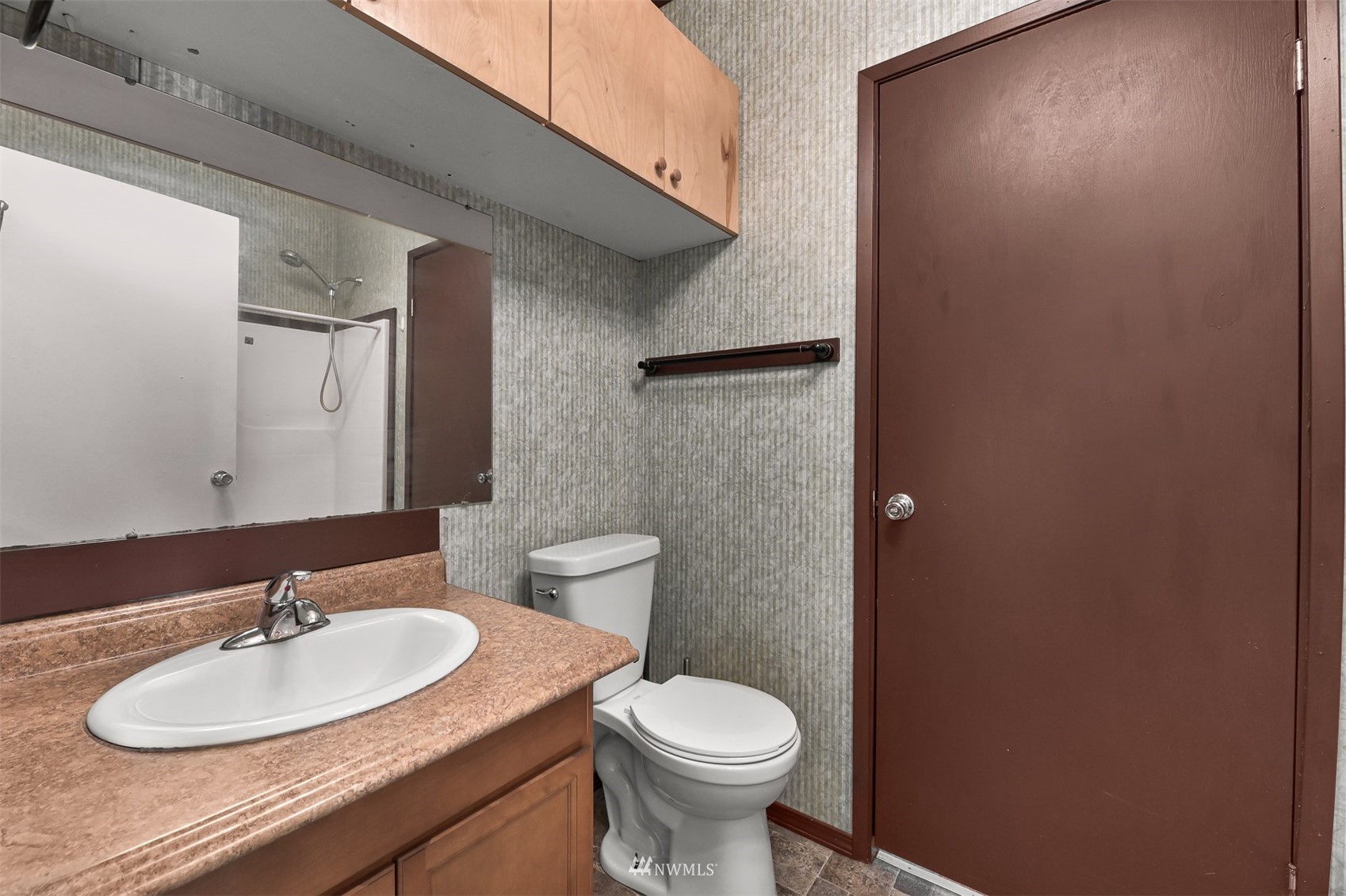 3053 Lummi Shore Road Bellingham, WA 98226 - Photo 21 of 37 a bathroom with a sink and a toilet