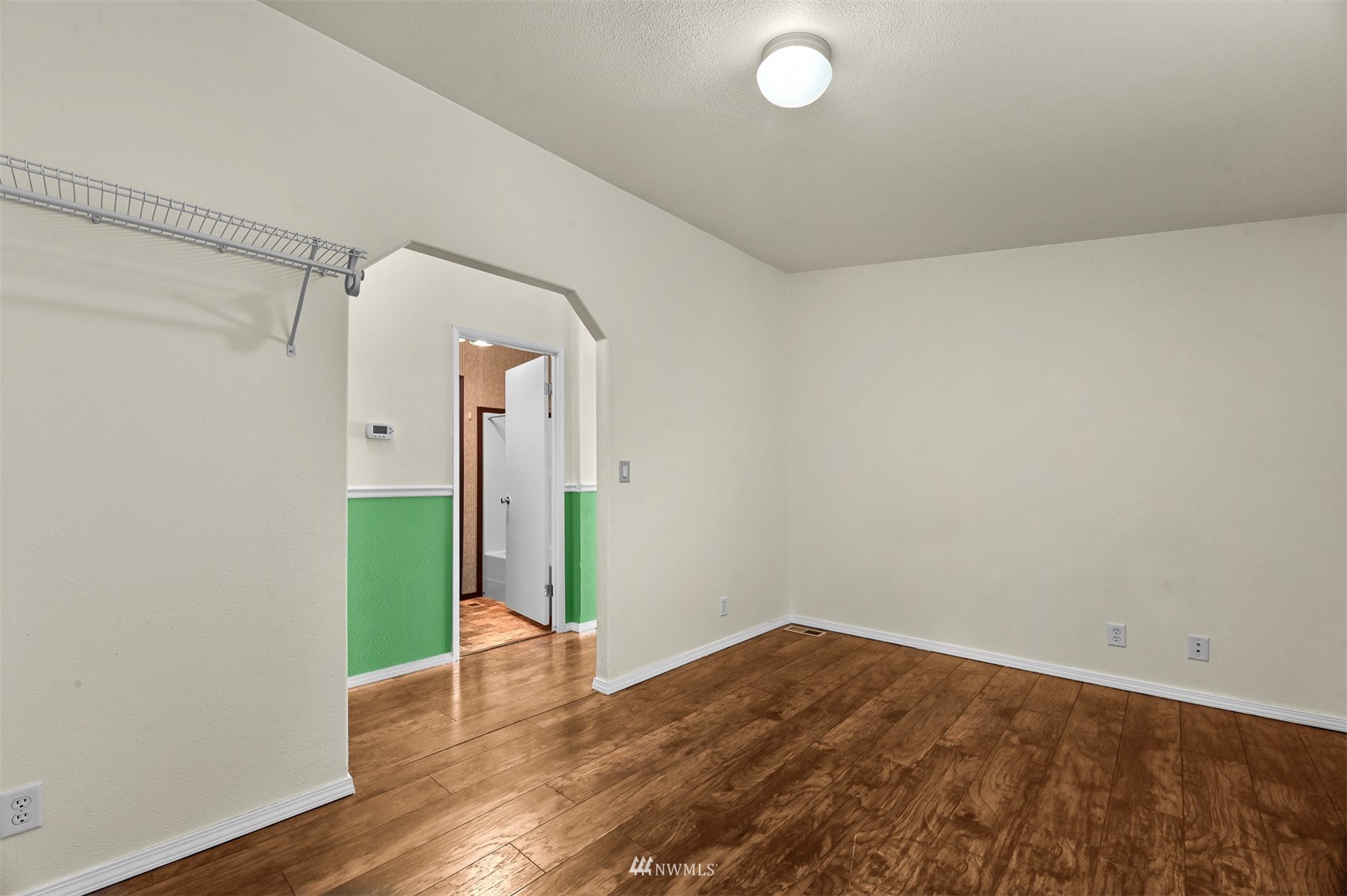 3053 Lummi Shore Road Bellingham, WA 98226 - Photo 22 of 37 a view of empty room with wooden floor