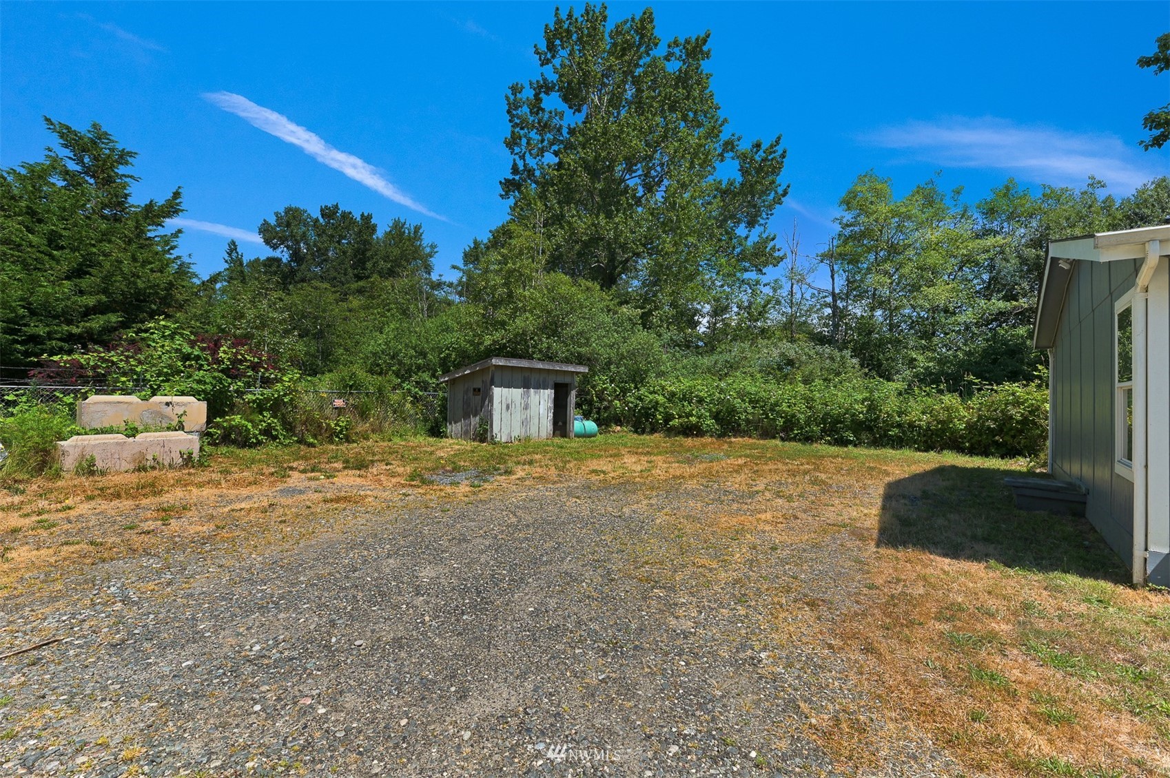 3053 Lummi Shore Road Bellingham, WA 98226 - Photo 34 of 37 a front view of a house with a yard