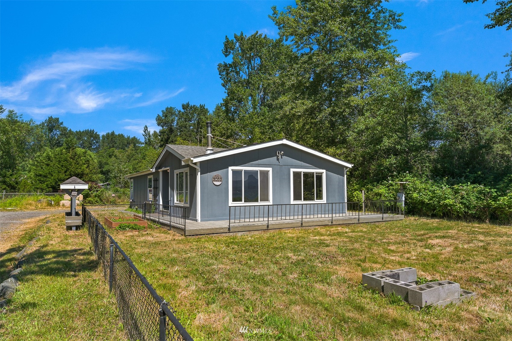 3053 Lummi Shore Road Bellingham, WA 98226 - Photo 35 of 37 a front view of a house with a yard