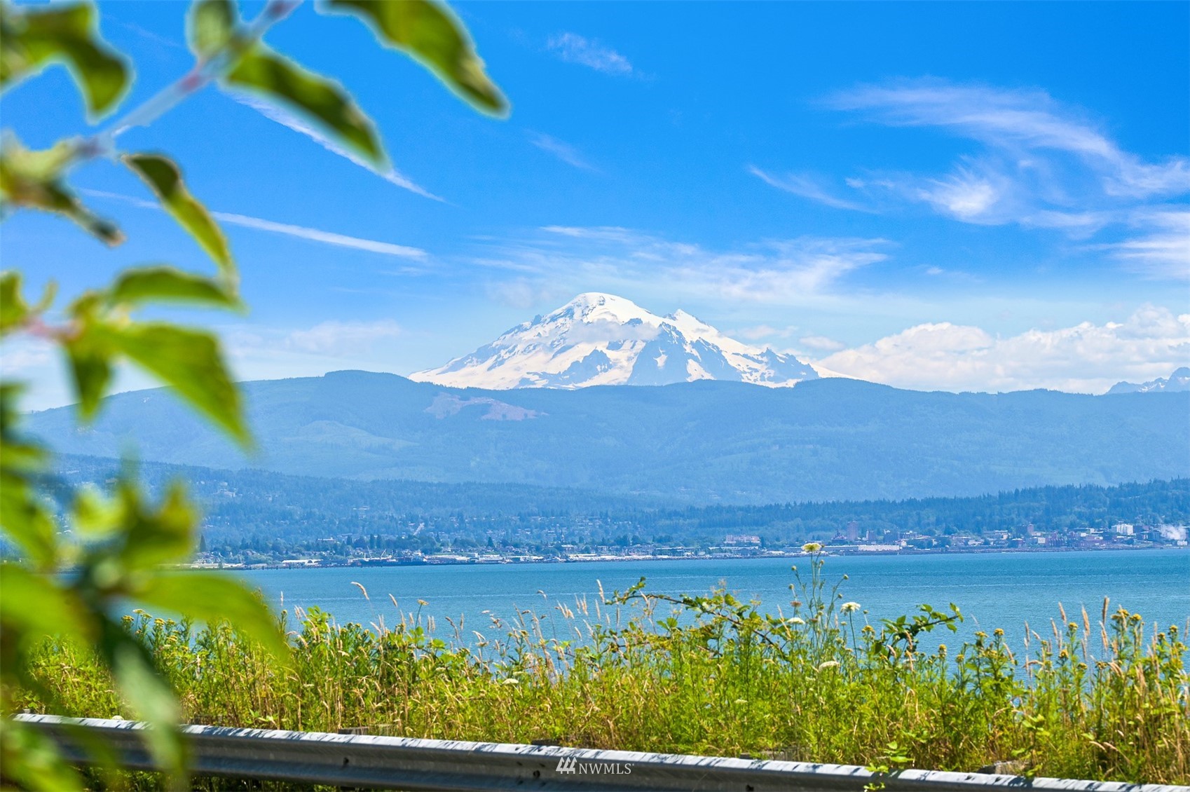 3053 Lummi Shore Road Bellingham, WA 98226 - Photo 37 of 37 a view of a lake with a mountain in the background