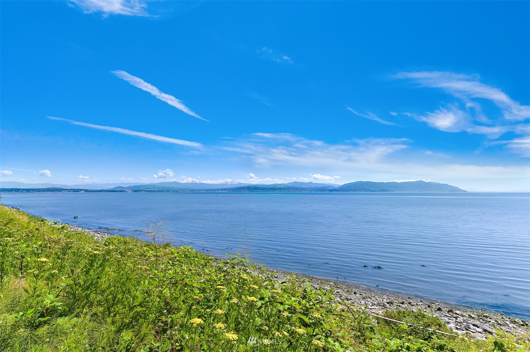 3053 Lummi Shore Road Bellingham, WA 98226 - Photo 4 of 37 a view of an ocean from a balcony