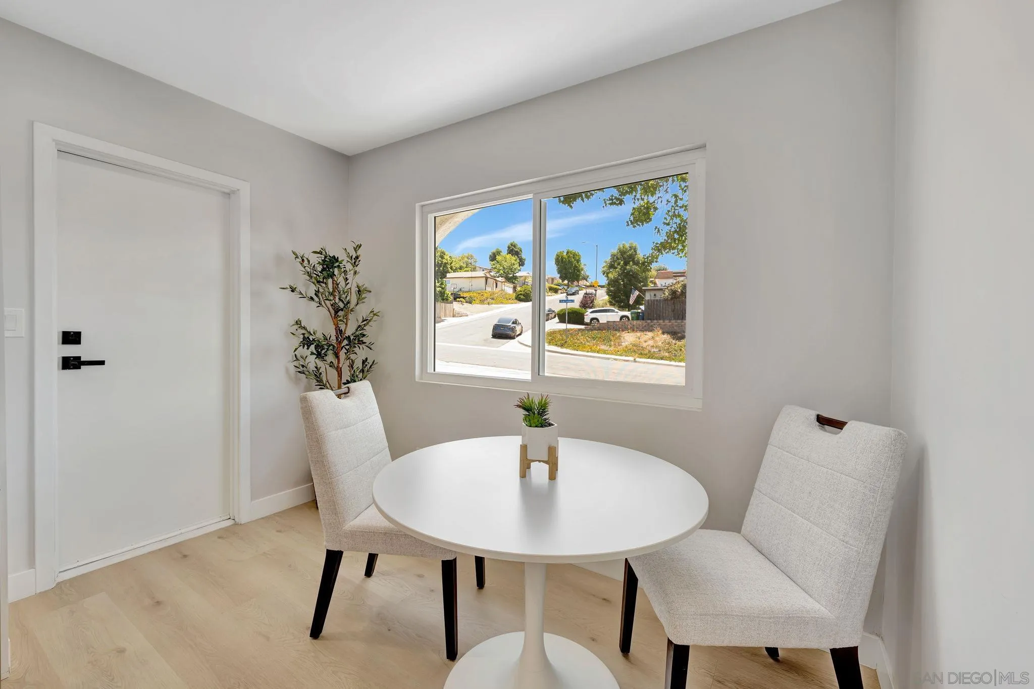 9324 Las Lomas Drive Santee, CA 92071 - Photo 4 of 11 a view of a dining room with furniture and window