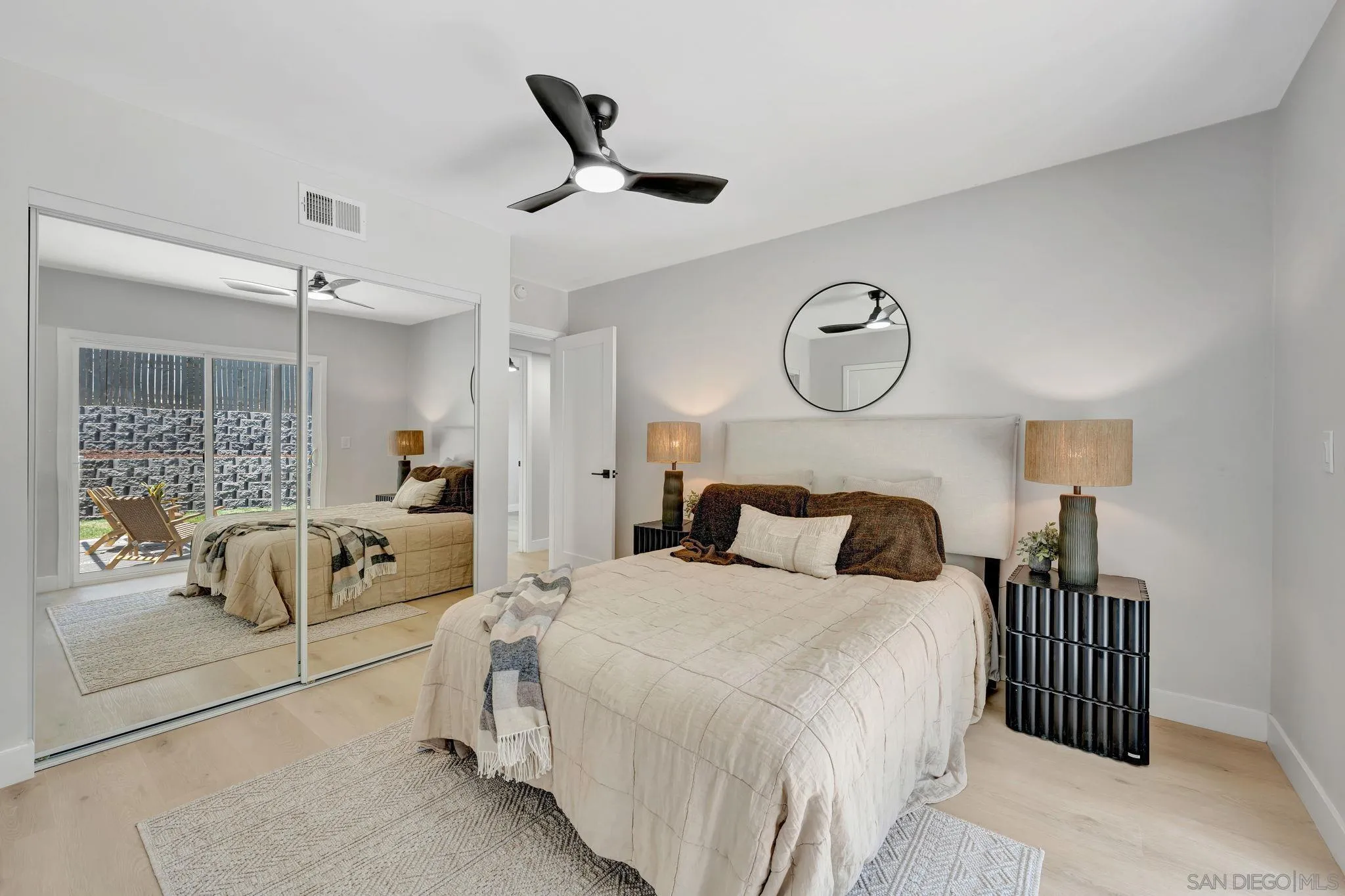 9324 Las Lomas Drive Santee, CA 92071 - Photo 7 of 11 a bedroom with a bed and window