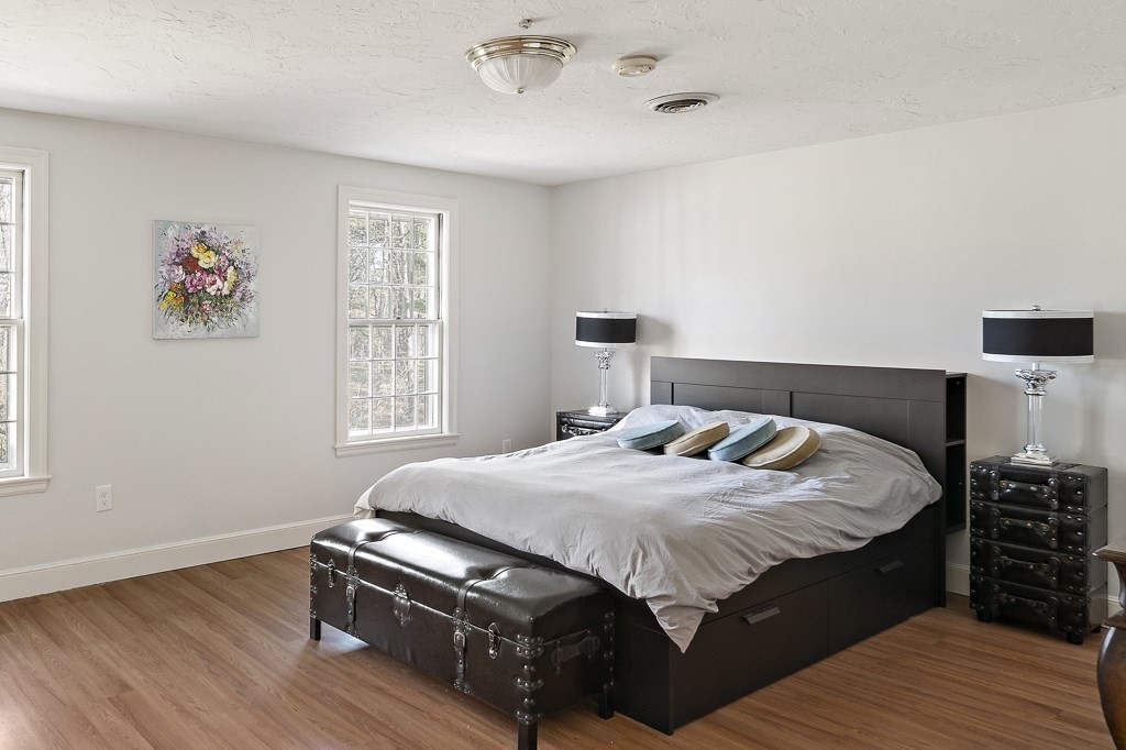 2 Partridge Hill Road Dover, MA 02030 - Photo 17 of 26 a bedroom with a bed and a window