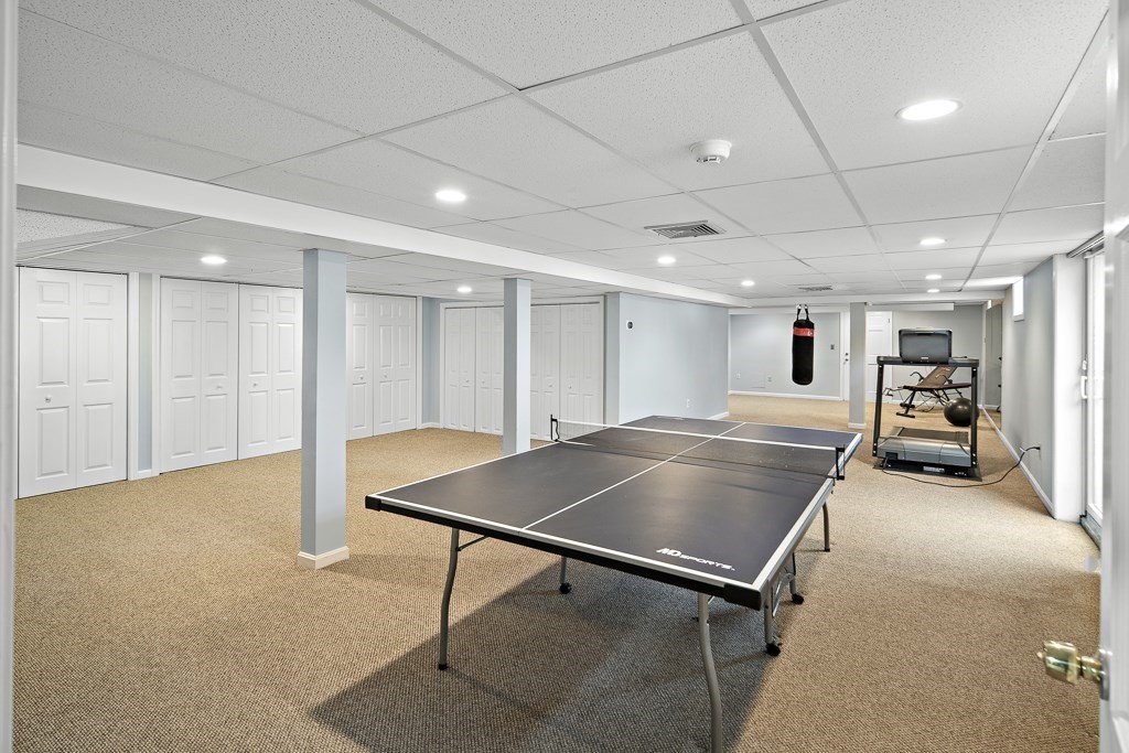 2 Partridge Hill Road Dover, MA 02030 - Photo 21 of 26 a room with table chairs and wooden floor