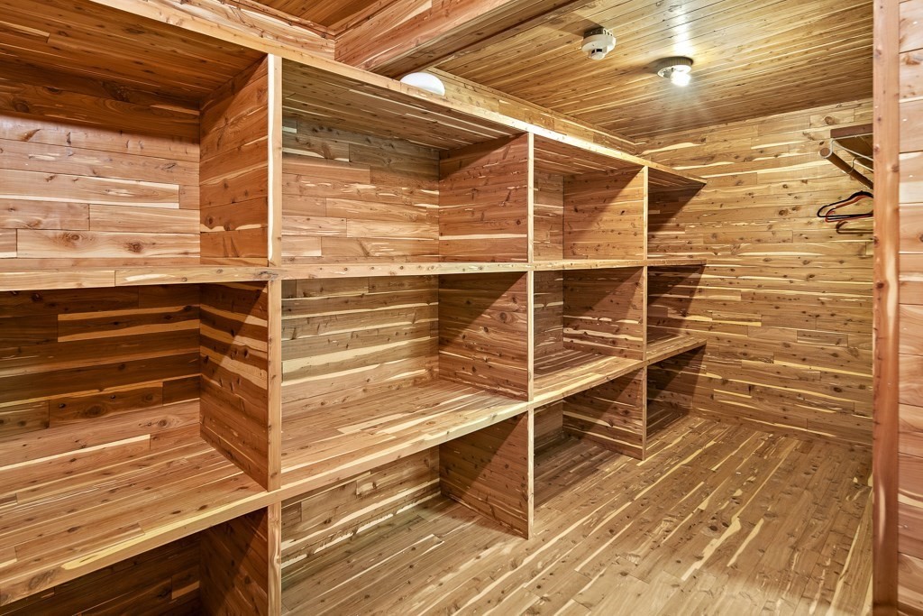 2 Partridge Hill Road Dover, MA 02030 - Photo 22 of 26 a view of an empty room with wooden floor and a window
