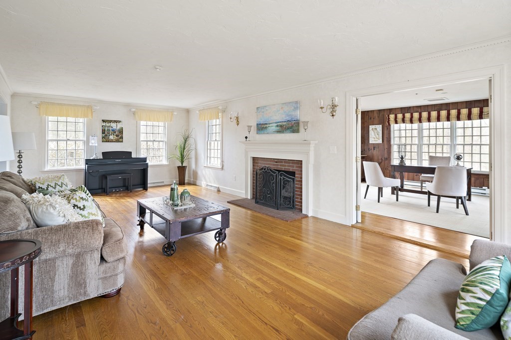 2 Partridge Hill Road Dover, MA 02030 - Photo 3 of 26 a living room with furniture and a fireplace