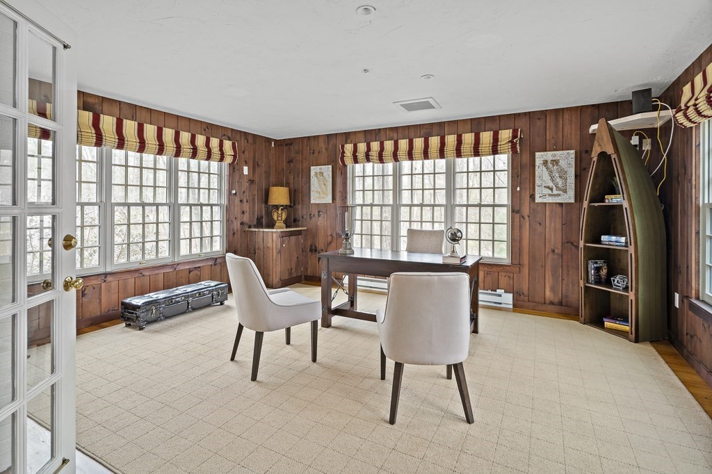 2 Partridge Hill Road Dover, MA 02030 - Photo 5 of 26 a living room with furniture a flat screen tv and a large window