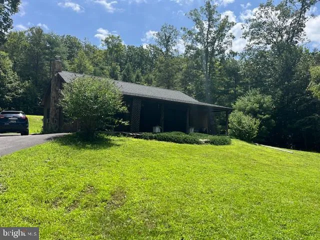 a view of a backyard with a garden