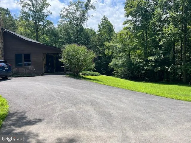 a view of an outdoor space and a yard