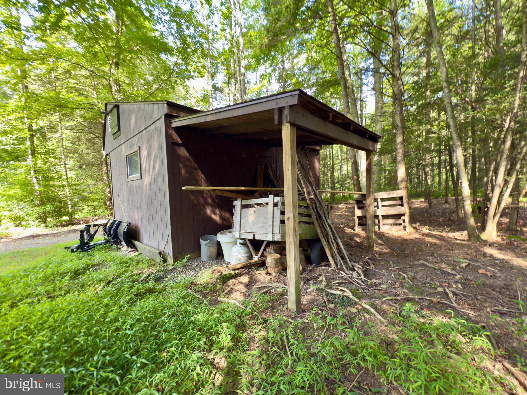 70 Kathryn Road McClure, PA 17841 - Photo 21 of 29 a view of a backyard with a table and chairs