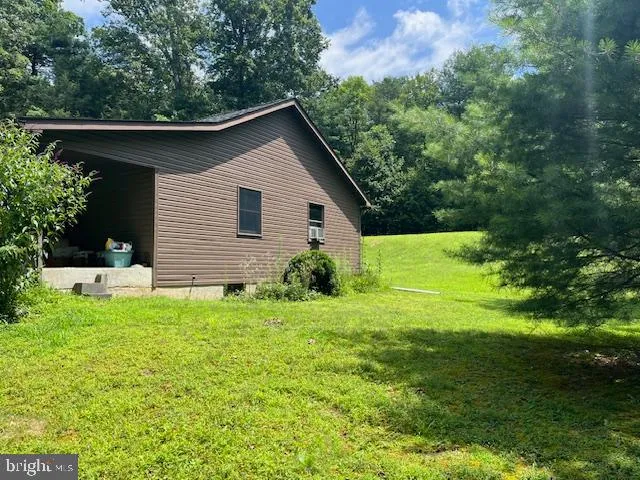 a house view with a garden space