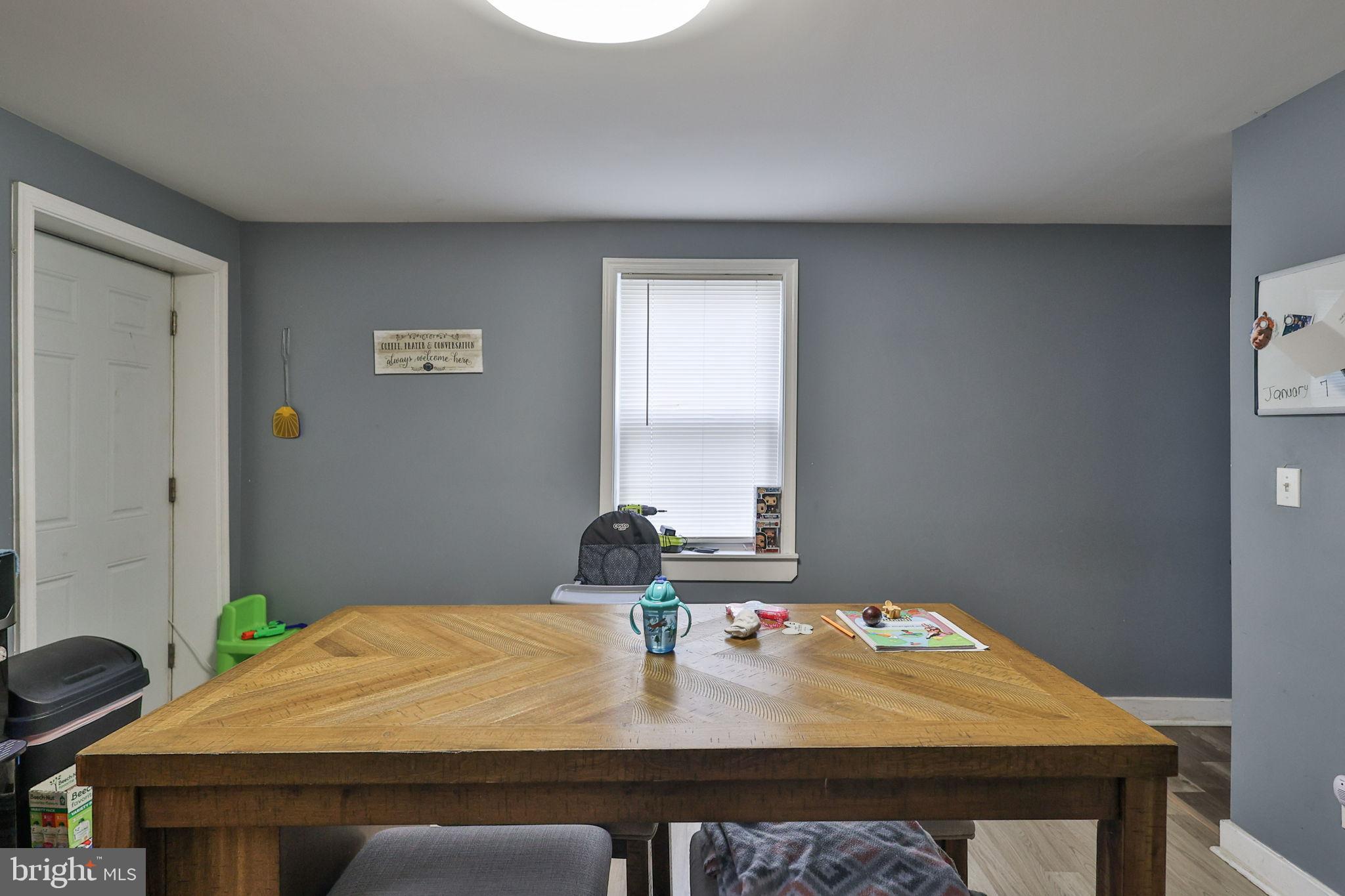 714 Ward Street Chester, PA 19013 - Photo 19 of 40 a dining room with a table and chairs