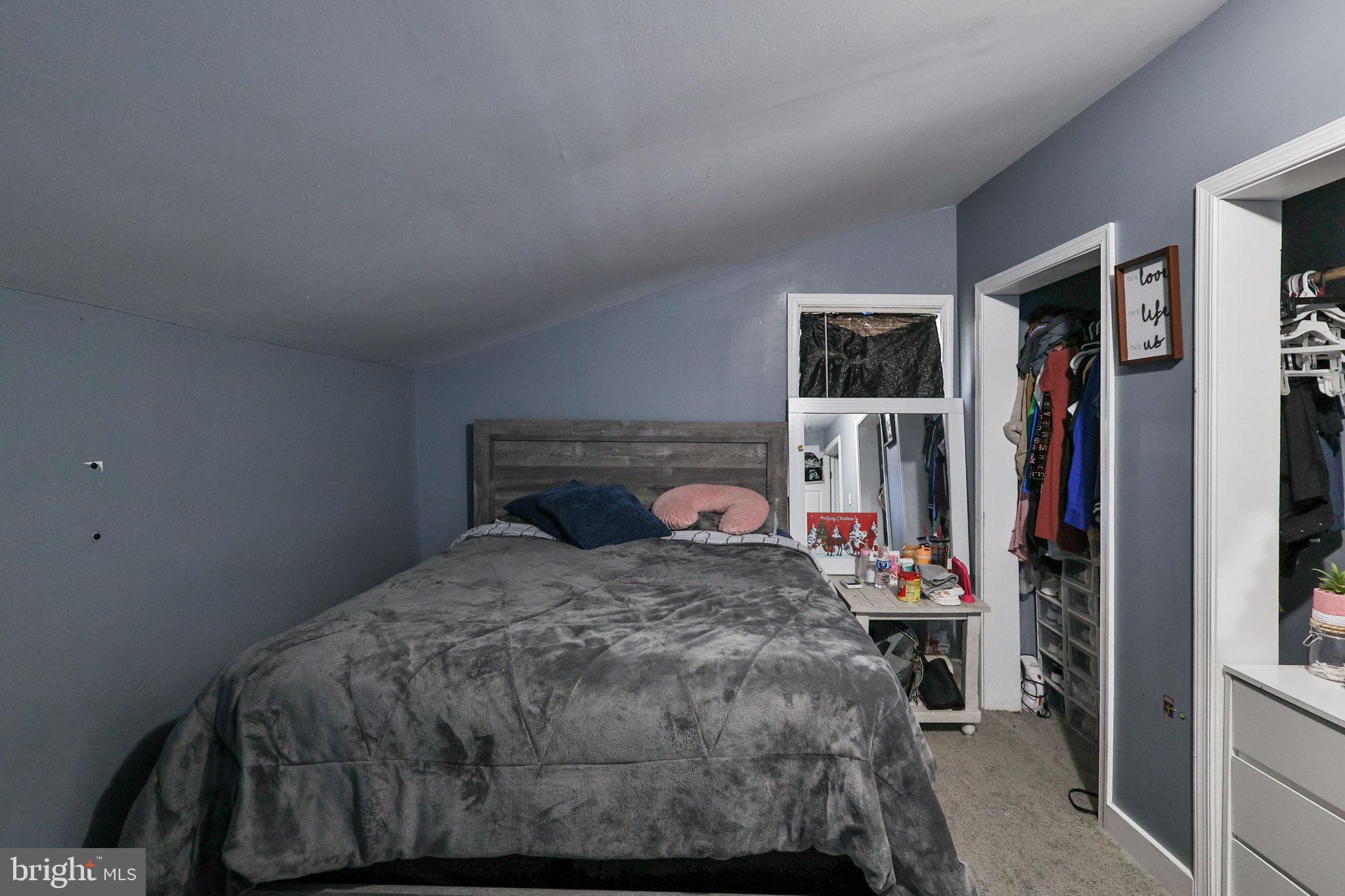 714 Ward Street Chester, PA 19013 - Photo 27 of 40 a bedroom with a bed and a window